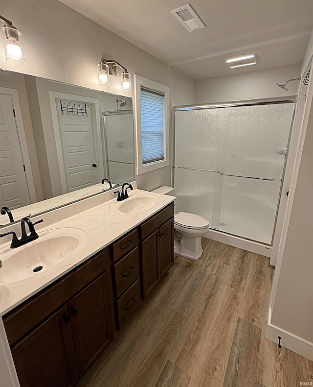 9 Beacon Way, Washington, IN 47501 - full bath featuring wood finished floors, a shower stall, and double vanity