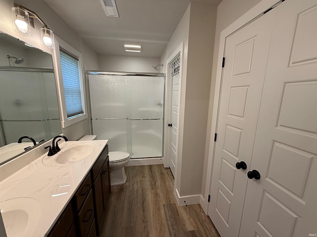 9 Beacon Way, Washington, IN 47501 - bathroom with wood finished floors, a stall shower, and double vanity