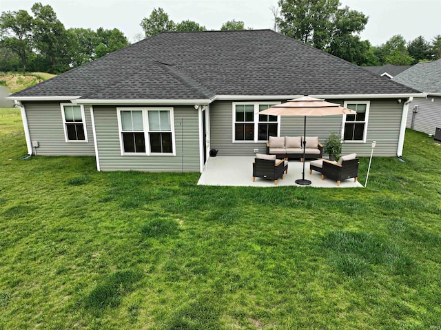 9 Beacon Way, Washington, IN 47501 - rear view of property featuring outdoor lounge area, roof with shingles, a patio area, and a lawn