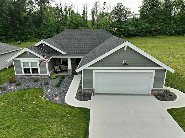 9 Beacon Way, Washington, IN 47501 - craftsman inspired home featuring stone siding, driveway, a front lawn, and a garage