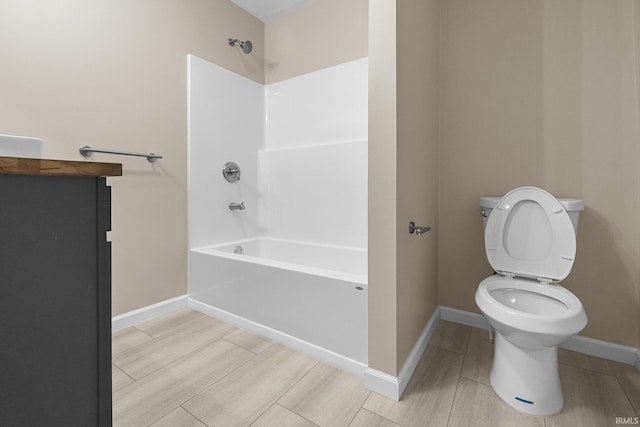 307 W Flora St, Washington, IN 47501 - bathroom featuring shower / bath combination and wood finish floors