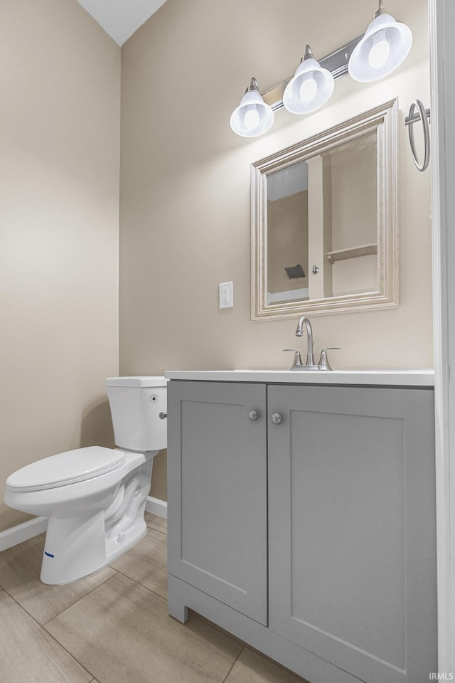 307 W Flora St, Washington, IN 47501 - bathroom with toilet and vanity
