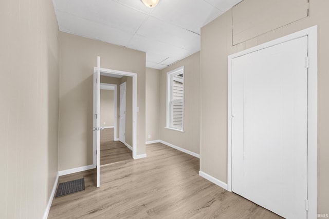 307 W Flora St, Washington, IN 47501 - foyer with light wood-style floors and a drop ceiling