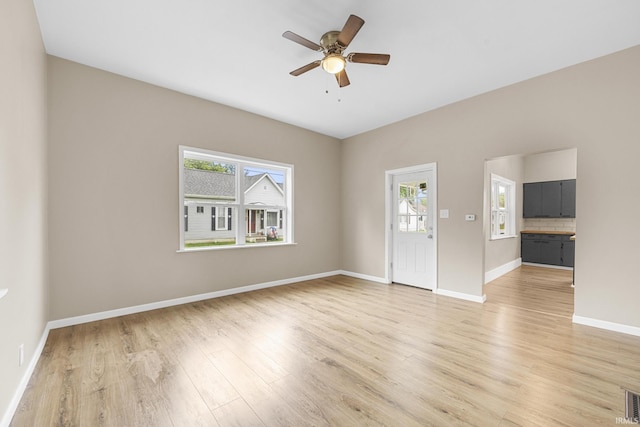 307 W Flora St, Washington, IN 47501 - spare room with ceiling fan and light wood-type flooring