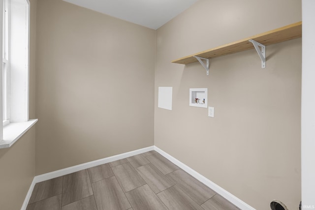 307 W Flora St, Washington, IN 47501 - washroom with hookup for a washing machine and wood finish floors