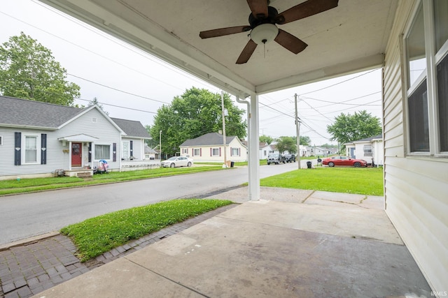 307 W Flora St, Washington, IN 47501 - view of patio with a residential view and ceiling fan