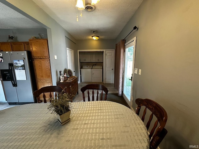 1114 W 4th St, Marion, IN 46952 - dining space featuring independent washer and dryer, a textured ceiling, and carpet floors