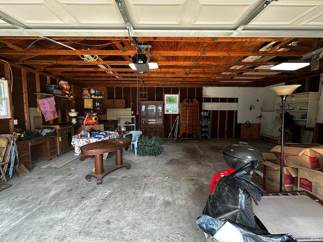 1114 W 4th St, Marion, IN 46952 - garage featuring a garage door opener