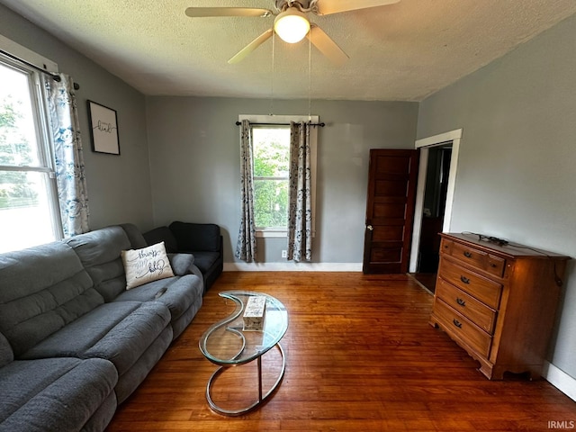 1114 W 4th St, Marion, IN 46952 - living room with wood finished floors, ceiling fan, and a textured ceiling