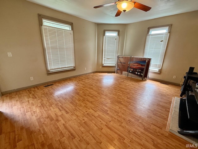 313 N Embree St, Princeton, IN 47670 - living room with light wood-style floors and ceiling fan