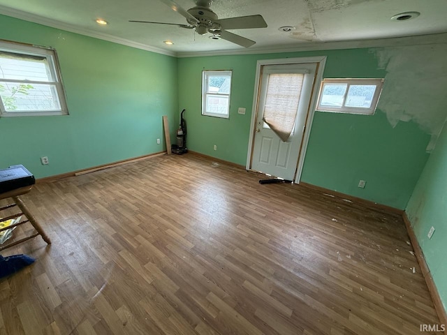 313 N Embree St, Princeton, IN 47670 - unfurnished room featuring ornamental molding, wood finished floors, and a ceiling fan