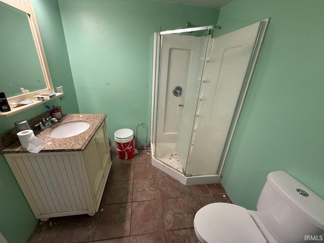 313 N Embree St, Princeton, IN 47670 - full bathroom featuring vanity, a shower stall, and tile patterned floors