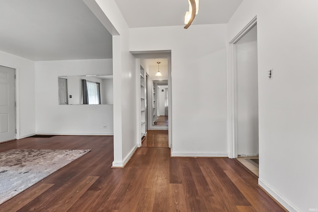 5309 S Hanna St, Fort Wayne, IN 46806 - hallway featuring wood finished floors and baseboards