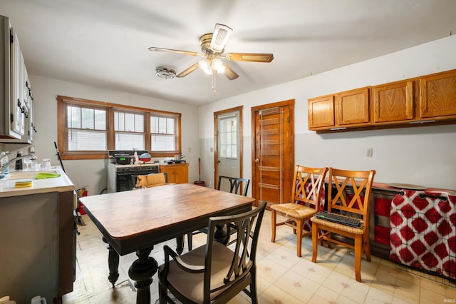1614 E 24th St, Muncie, IN 47302 - dining space featuring a ceiling fan and light floors