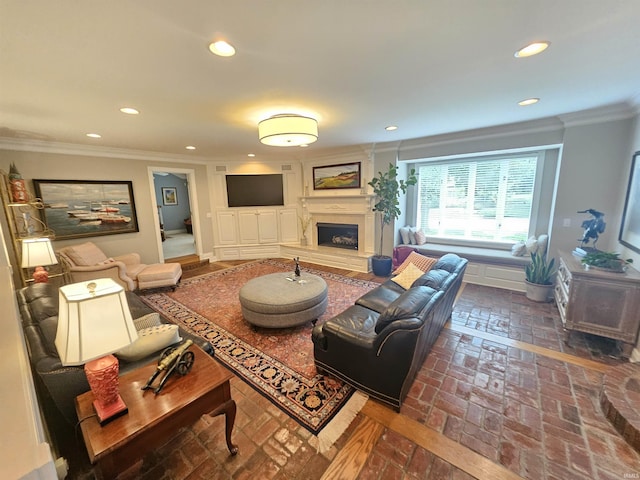 16 Johnson Pl, Evansville, IN 47714 - living room featuring crown molding, brick flooring, a fireplace with raised hearth, and recessed lighting
