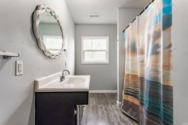 1000 N 500 E, Anderson, IN 46012 - full bath with vanity and wood finished floors