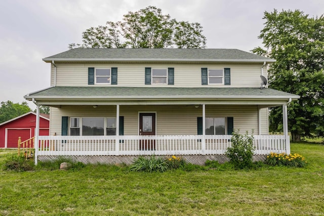 1000 N 500 E, Anderson, IN 46012 - view of front of home featuring covered porch, an outdoor structure, a front lawn, and a detached garage