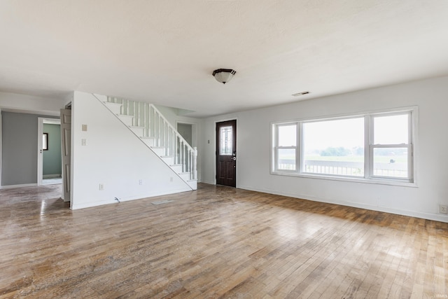 1000 N 500 E, Anderson, IN 46012 - entryway featuring hardwood / wood-style floors and stairway