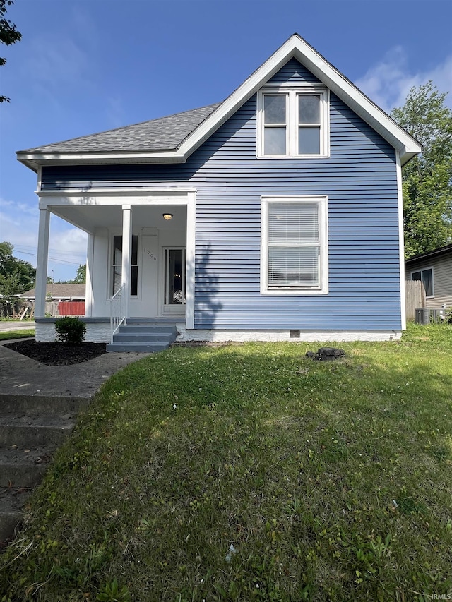 1906 N 15th St, Lafayette, IN 47904 - view of front of home featuring a porch, a front yard, and roof with shingles