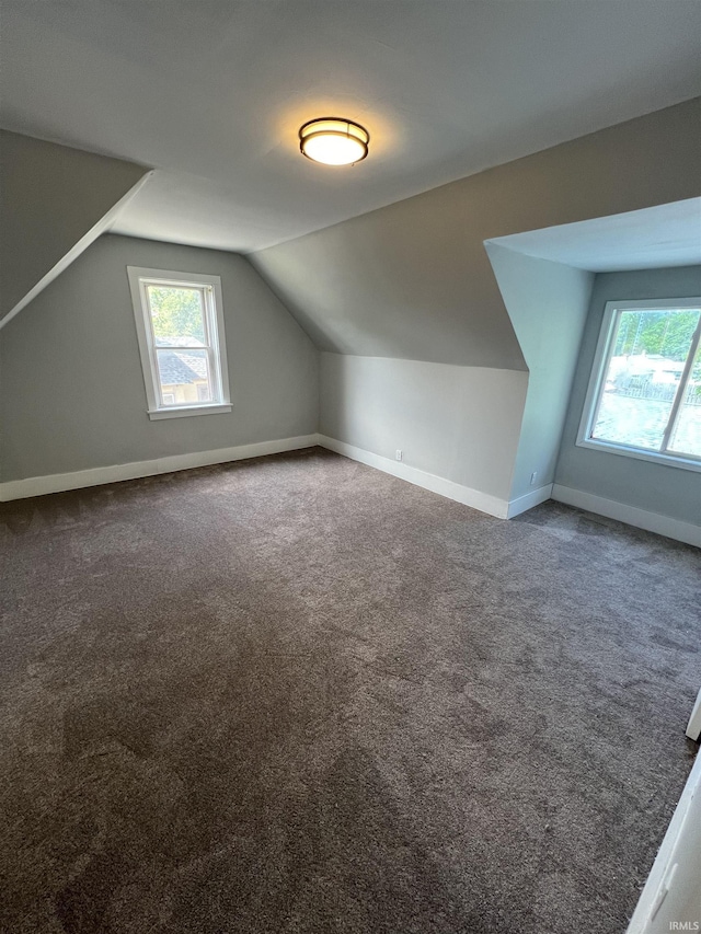 1906 N 15th St, Lafayette, IN 47904 - bonus room with lofted ceiling and carpet flooring