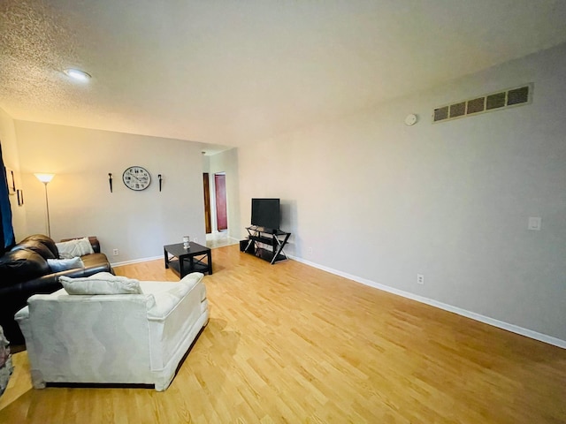 125 Shalley Dr, Plymouth, IN 46563 - living room with light wood-style flooring and baseboards