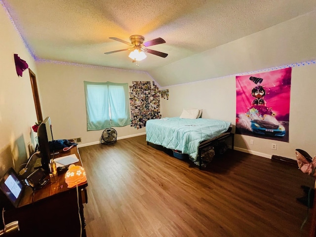 125 Shalley Dr, Plymouth, IN 46563 - bedroom featuring wood finished floors, a textured ceiling, vaulted ceiling, and ceiling fan