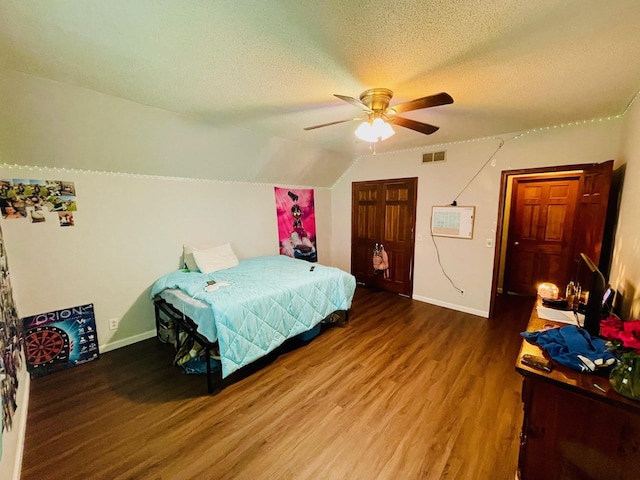 125 Shalley Dr, Plymouth, IN 46563 - bedroom with wood finished floors, a textured ceiling, ceiling fan, and lofted ceiling