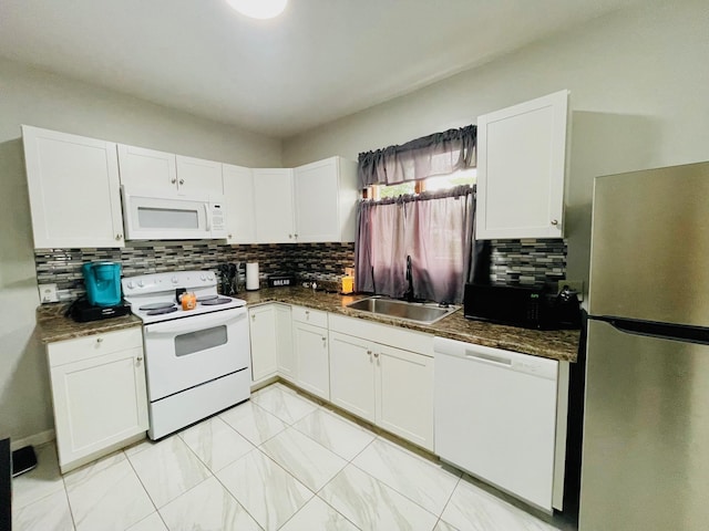 125 Shalley Dr, Plymouth, IN 46563 - kitchen with white appliances, white cabinetry, tasteful backsplash, and light marble finish flooring