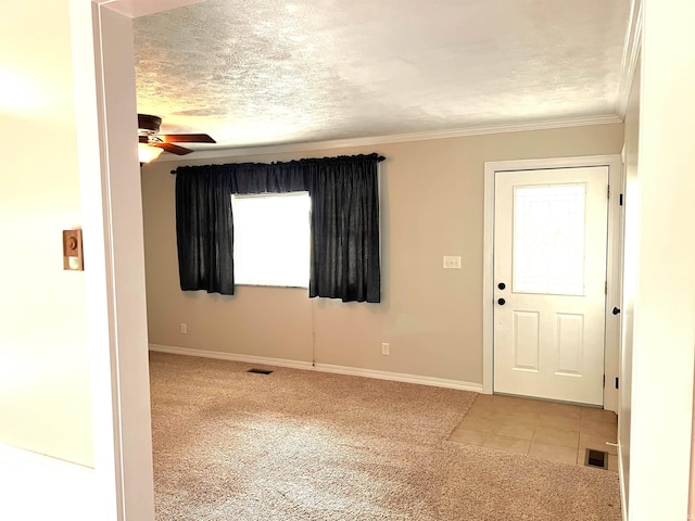 758 W 400 S Rd, Wabash, IN 46992 - carpeted foyer featuring a textured ceiling, ceiling fan, healthy amount of natural light, crown molding, and tile patterned floors