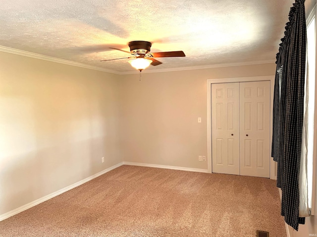 758 W 400 S Rd, Wabash, IN 46992 - unfurnished bedroom with light carpet, a textured ceiling, a closet, ceiling fan, and ornamental molding