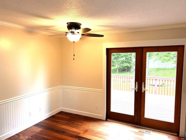 758 W 400 S Rd, Wabash, IN 46992 - doorway to outside featuring french doors, wood finished floors, a textured ceiling, a wainscoted wall, and a ceiling fan
