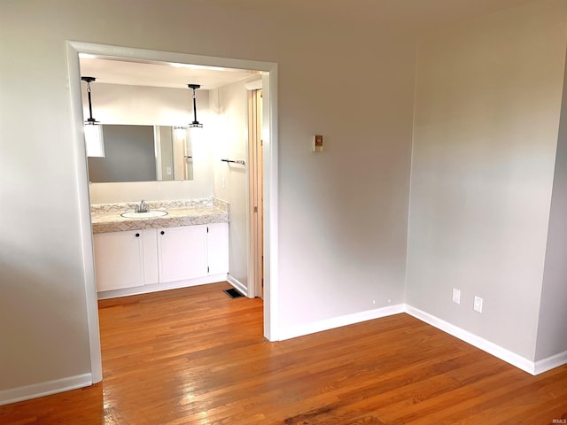 758 W 400 S Rd, Wabash, IN 46992 - bathroom with wood finished floors and vanity