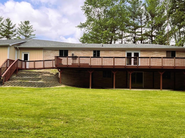 758 W 400 S Rd, Wabash, IN 46992 - back of property featuring a deck, a yard, a shingled roof, and brick siding
