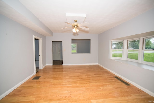 631 W 8th St, Bicknell, IN 47512 - unfurnished room featuring a ceiling fan and light wood-style floors