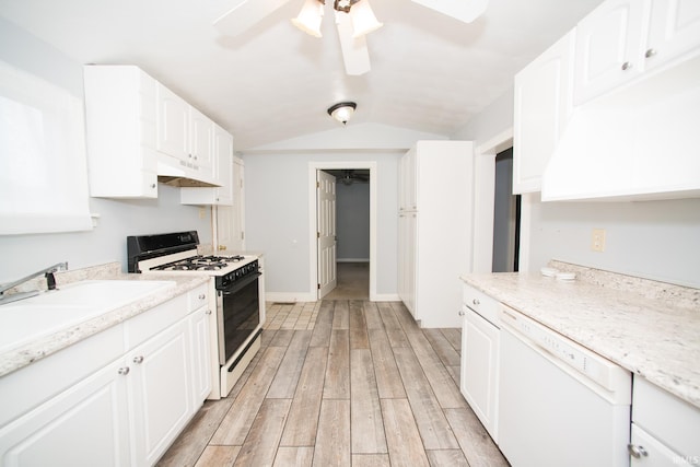 631 W 8th St, Bicknell, IN 47512 - kitchen featuring range with gas stovetop, white dishwasher, under cabinet range hood, a ceiling fan, and lofted ceiling