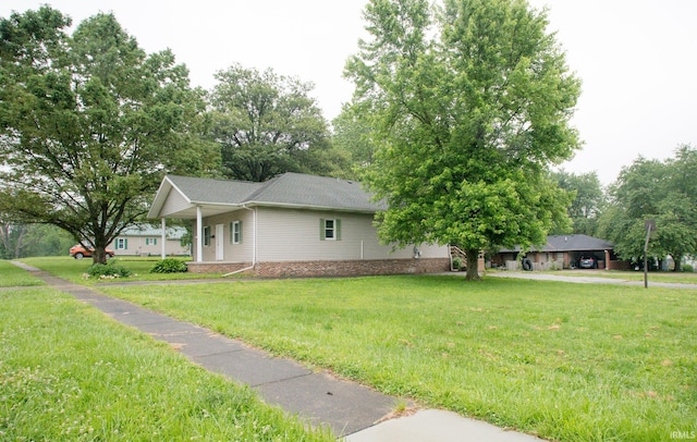 631 W 8th St, Bicknell, IN 47512 - view of front of house featuring a front yard