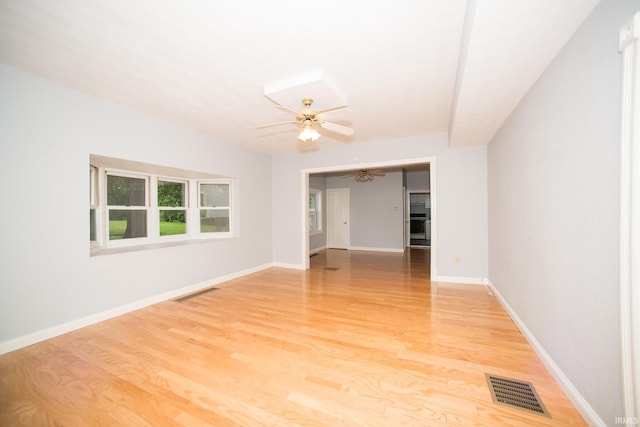 631 W 8th St, Bicknell, IN 47512 - spare room featuring ceiling fan and light wood-style floors