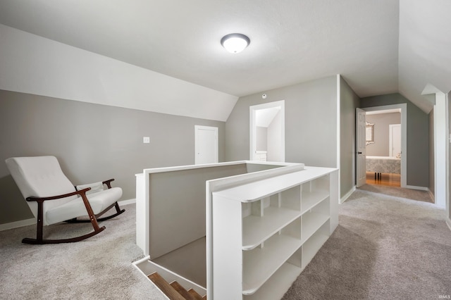 110 E Harrison St, Spiceland, IN 47385 - corridor with carpet floors, lofted ceiling, and an upstairs landing