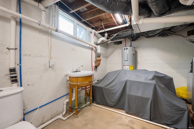 110 E Harrison St, Spiceland, IN 47385 - below grade area with water heater and a sink