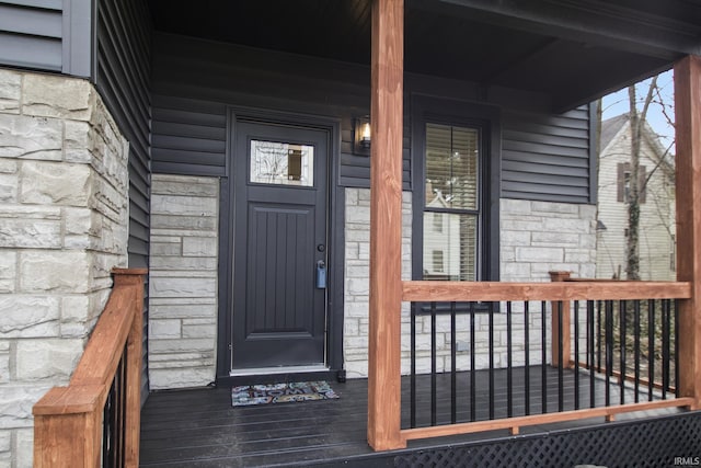 516 W Navarre St, South Bend, IN 46616 - entrance to property featuring stone siding and covered porch