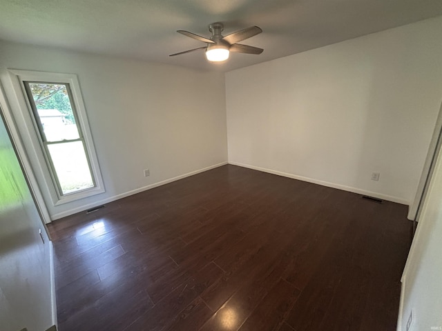 1821 E Johnson Ln, Vincennes, IN 47591 - spare room with dark wood-style flooring and ceiling fan