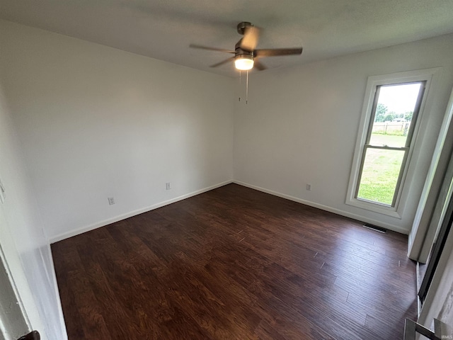 1821 E Johnson Ln, Vincennes, IN 47591 - empty room with dark wood-style floors and a ceiling fan