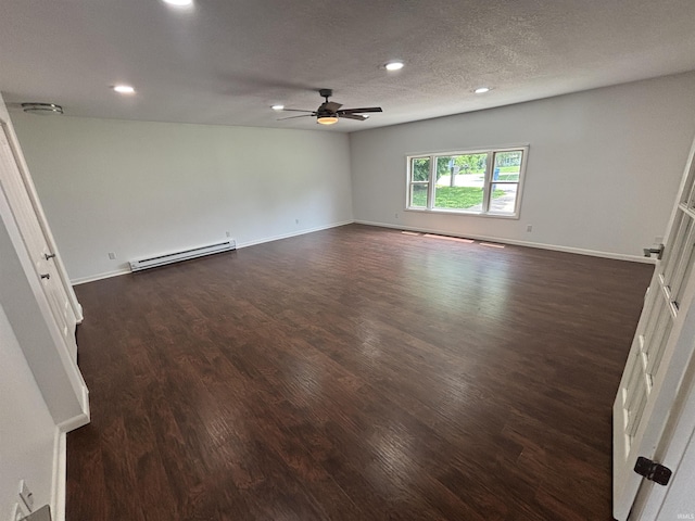 1821 E Johnson Ln, Vincennes, IN 47591 - spare room featuring a baseboard heating unit, dark wood finished floors, ceiling fan, recessed lighting, and a textured ceiling