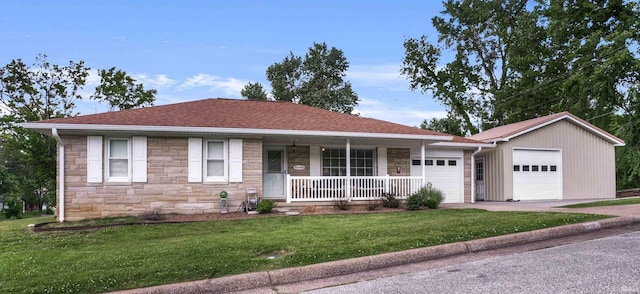 2208 Franklin St, Tell City, IN 47586 - ranch-style house with stone siding, a porch, a garage, and a front lawn