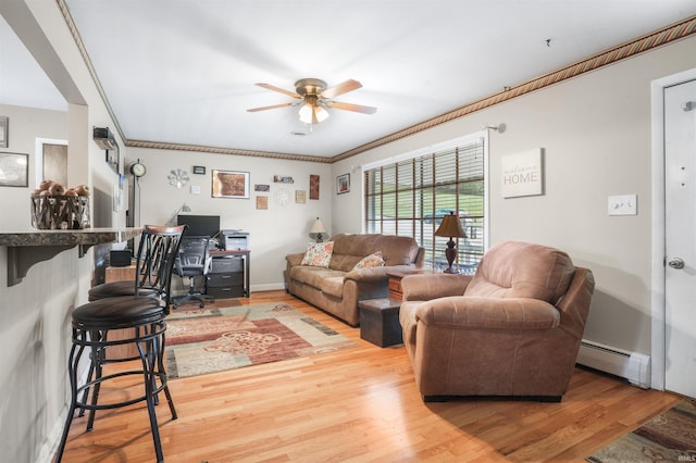 2208 Franklin St, Tell City, IN 47586 - living area with baseboard heating, an office area, ceiling fan, wood finished floors, and crown molding