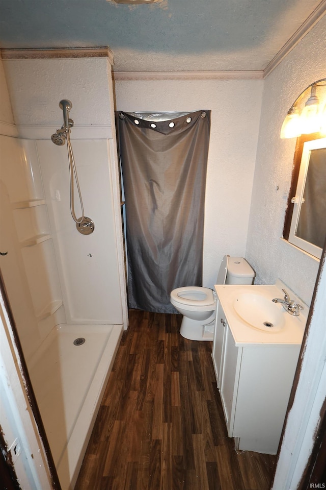 901 Lawndale Ave, South Bend, IN 46628 - full bathroom with a textured wall, wood finished floors, vanity, a shower, and crown molding