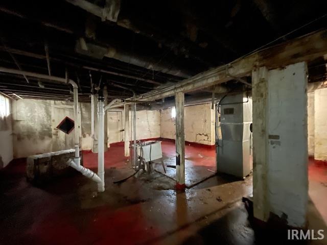 758 N Olive St, South Bend, IN 46628 - unfinished basement featuring heating unit