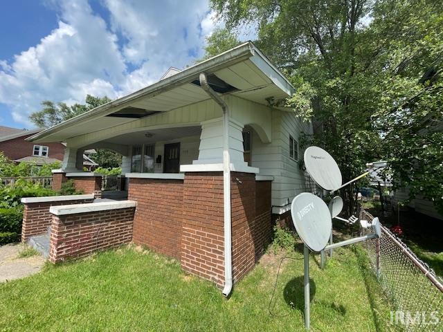 758 N Olive St, South Bend, IN 46628 - view of side of property featuring brick siding
