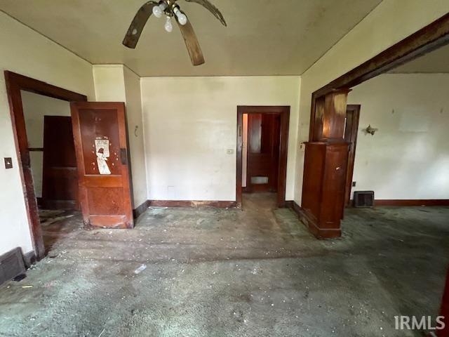 758 N Olive St, South Bend, IN 46628 - unfurnished room with a ceiling fan and concrete flooring