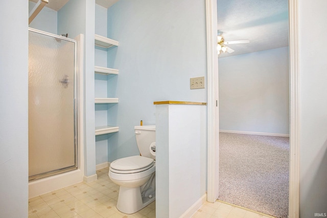13920 Lexington Cir, Granger, IN 46530 - bathroom with a stall shower, ceiling fan, built in shelves, and tile patterned floors